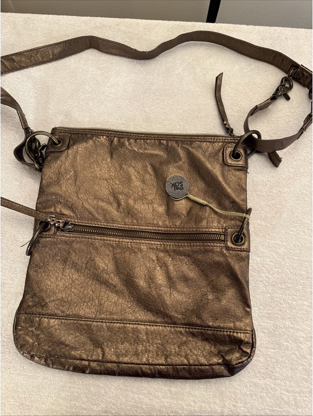 The Sak Metallic Gold Shoulder Bag Zip Top Gold Hardware Pockets